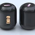 Two Modern Black Headphones Speakers With Sleek Design And Gold Accent Buttons