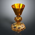 Elegant Golden Wine Bottle And Glass Set With Ornate Base And Gemstone Accents For Luxury