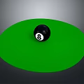 Green Circular Billiard Table Surface With Black 8 Ball Centered On Top