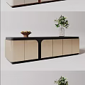 Modern TV Stand With Beige And Black Design Featuring Fruit Basket And Green Plant