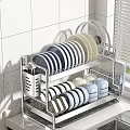 Stainless Steel Dish Drying Rack With Plates Bowls And Cups On Kitchen Countertop