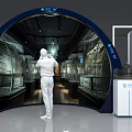 Modern Tech Exhibition Hall With Curved Glass Displays Blue Illuminated Signs And Visitor Interaction