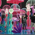 Colorful Decorative Installation Featuring Pink Purple Giraffe Flamingo Lights And Plants