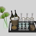 Wine Bottles and Wine Glasses on Black Tray with Ice Bucket Nuts and Green Vase