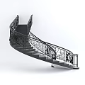 Black Spiral Staircase With Intricate Wrought Iron Railings And Curved Design