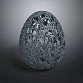 Artistic Intricately Carved Egg Shaped Decorative Sculpture With Floral Patterns