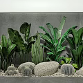 Lush Indoor Plant Arrangement With Green Tropical Leaves Cacti Stones And Grey Wall