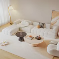 White Sectional Sofa Coffee Table Set With Potted Plant Floor Lamp And Abstract Wall Art