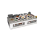 Buffet Table With White Bowls Various Foods Chafing Dishes And Shelved Utensils