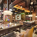 Stylish Restaurant Interior With Wooden Tables Leather Chairs Pendant Lights And Brick Walls