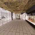 Cultural Center Interior Design Featuring Traditional Golden Ceiling Stone Carvings And Exhibition Corridor