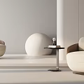 Modern Minimalist Beige Single Sofas with White Spherical Decor and Round Side Table