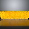 Vintage Yellow Rectangular Container With Worn Surface And Reflection On Black Surface