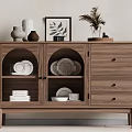 Wooden Sideboard With Arched Glass Doors Drawers Plates Bowls And Decorative Vase Plant On Top