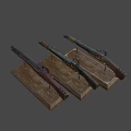 Two Antique Rifles With Wooden Stocks And Metal Components On Display Stands