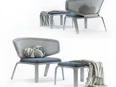 Woven Lounge Chair With Blue Cushion Matching Ottoman Decorative Pillows And Soft Blanket 3d model