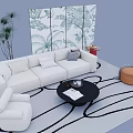White Sofa and Black Round Coffee Table with Geometric Rug Plant Screen in Living Room