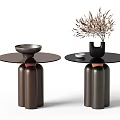 Modern Side Tables With Cylindrical Bases Round Black Tops And Decorative Metal Bowl Vase
