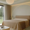 Modern Hotel Room with Large Window Mountain View Beige Curtains and Potted Plant