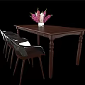Restaurant Dining Area Featuring Dark Brown Wooden Table Transparent Back Chairs And Flower Vase