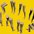 White Mannequin Leg Models In Various Poses Standing And Bending On Dark Blue Background