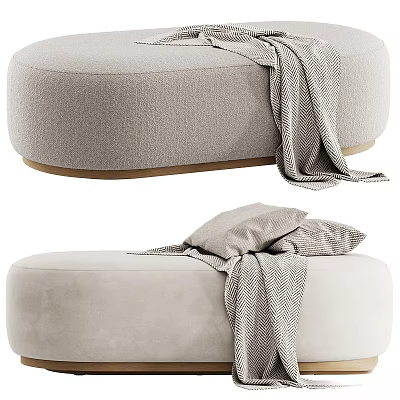Light Gray Upholstered Ottoman With Textured Fabric Surface And Draped Throw Blanket 3d model
