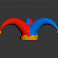Colorful Pointed Jester Hat With Red Blue Green Points Yellow Pom Poms And Orange Brim