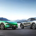 Green And Silver Modern Cars On Open Road With Mountain Backdrop And Blue Sky