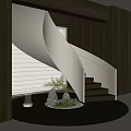 Modern Spiral Staircase Interior Design With Potted Plant And Decorative Stones