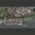 Aerial View of Charming Town With Red Rooftops Green Meadows and Waterfront Moored Boats