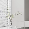 Modern Minimalist Vase with Small Flowers and Branches by White Blinds and Cabinet