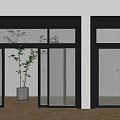 Modern Interior Glass Double Doors With Black Frame Wooden Floor And Green Plant