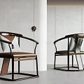 Modern Single Chair With Dark Brown Metal Frame And Light Colored Cushion In Minimalist Interior