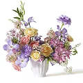 White Vase Floral Arrangement With Purple Pink Yellow Flowers And Greenery