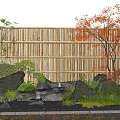 Traditional Karesansui Garden With Bamboo Fence Rocks Red Green Trees And Fallen Leaves
