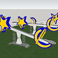 Outdoor Playground Seesaw With Star And Moon Shaped Blue Yellow Design On Grass