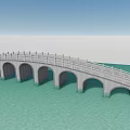 Stone Arch Bridge With Multiple Arches Over Turquoise Water And Railings
