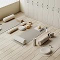 Yoga Sports Equipment with Mats Rollers Cushions and Lockers on Wooden Floor