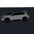 Sleek Silver SUV With Black Roof And Red Accent Wheels On Gray Floor
