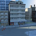 Commercial Street Lined With Multi story Modern Buildings Shops Signboards And Orange Traffic Cones