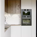 Modern Kitchen With Built In Double Ovens Marble Countertop And Wooden Cabinets