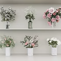Beautiful Flower Vases With Pink White Blooms And Green Foliage On Shelves