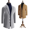 Two Stylish Grey Coats Displayed On Hangers With Wooden Bases