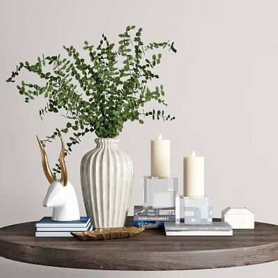 Ribbed White Vase With Green Eucalyptus Branches Deer Figurine Candles And Books 3d model