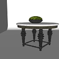 Round Dining Table With Marble Top Black Spiral Legs And Green Plant Bowl