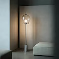 Modern Floor Lamp With Transparent Spherical Shade And Metal Base In Grey Wall Interior