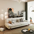 Modern Beige Two Seater Sofa With Decorative Pillows Floor Lamp Green Plant And Wall Art