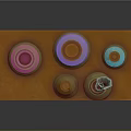 Laboratory Shelf with Bottles Colored Liquids and Funnel on Orange Wooden Stand