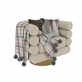 Plush Leisure Chair With Rounded Armrests Geometric Pillows And Plaid Pom Pom Throw