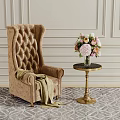 Tufted Beige Wingback Armchair With Draped Blanket Round Side Table Flowers Light Wall Geometric Rug